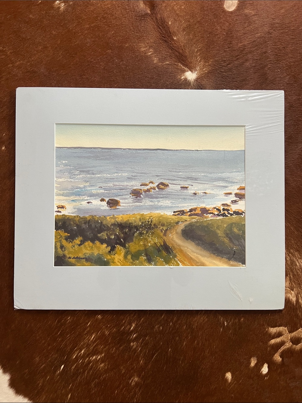 Seaside Landscape Watercolor art signed by artist in light blue mat